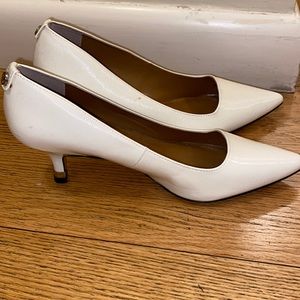 White leather high heels.